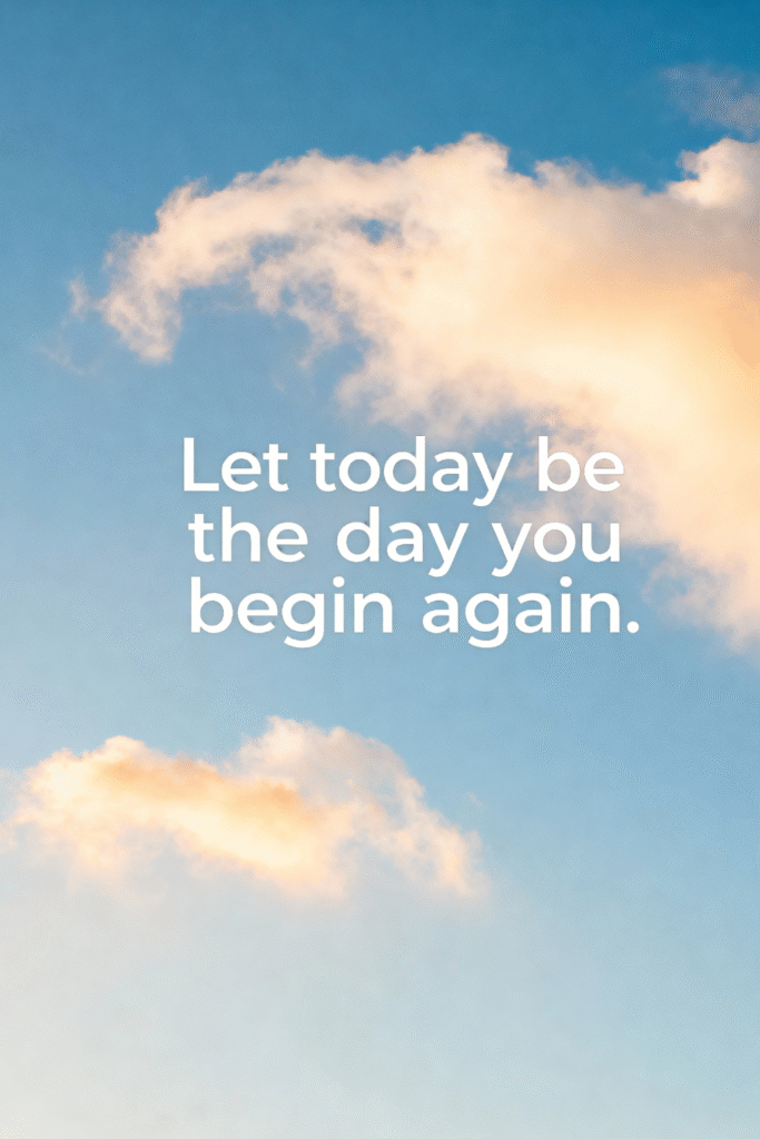 blue sky wallpaper with warm peach clouds and inspirational quote “let today be the day you begin again”
