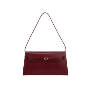 Structured burgundy shoulder bag with minimal gold buckle and clean lines — timeless everyday luxury.