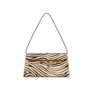 Zebra-print shoulder bag with brown strap and slim buckle detail — chic artisan-inspired accessory.